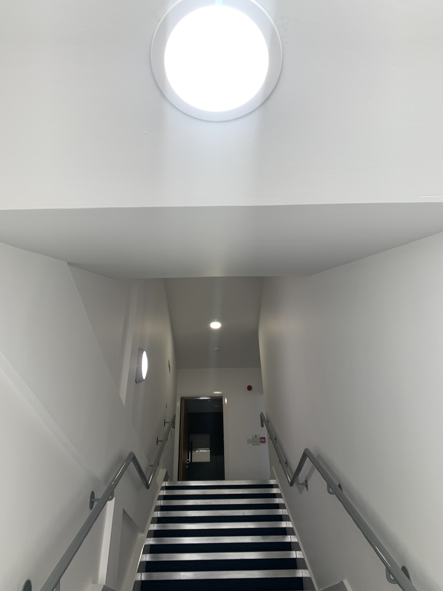 Lighting along an internal commercial stairwell