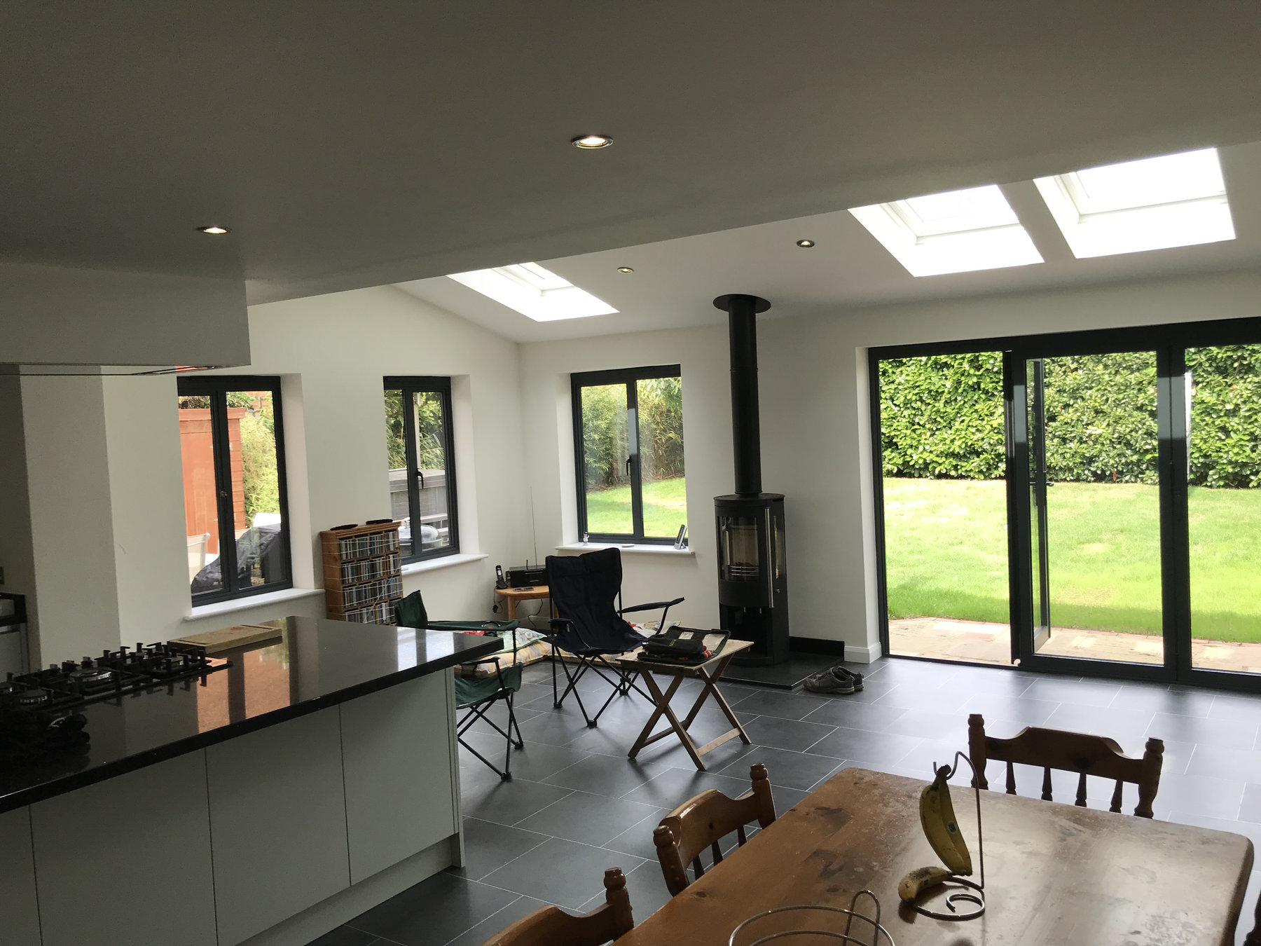 Finished domestic family room with ceiling lighting