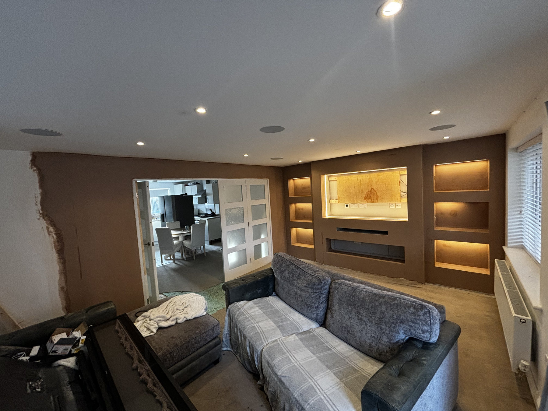 Living room with completed feature lighting in Wixams