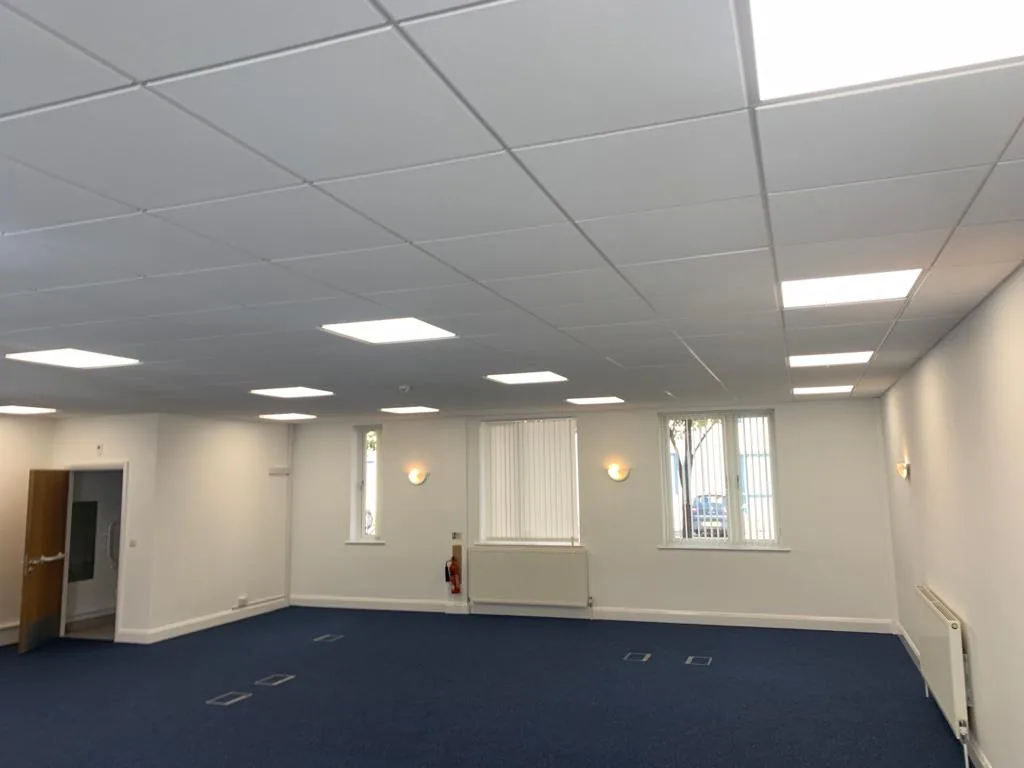 Ceiling lighting panels in an unfurnished office