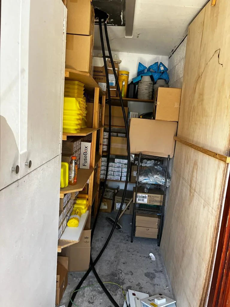 Electrical installation equipment beside a cabinet