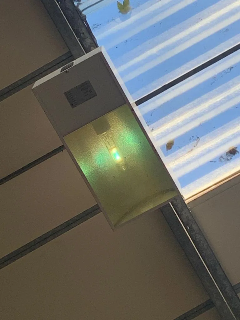Emergency exit lighting beneath roof windows