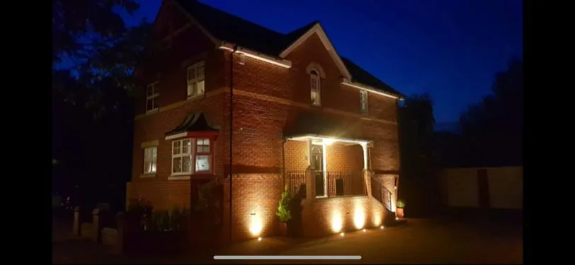 Exterior lighting on a house at night