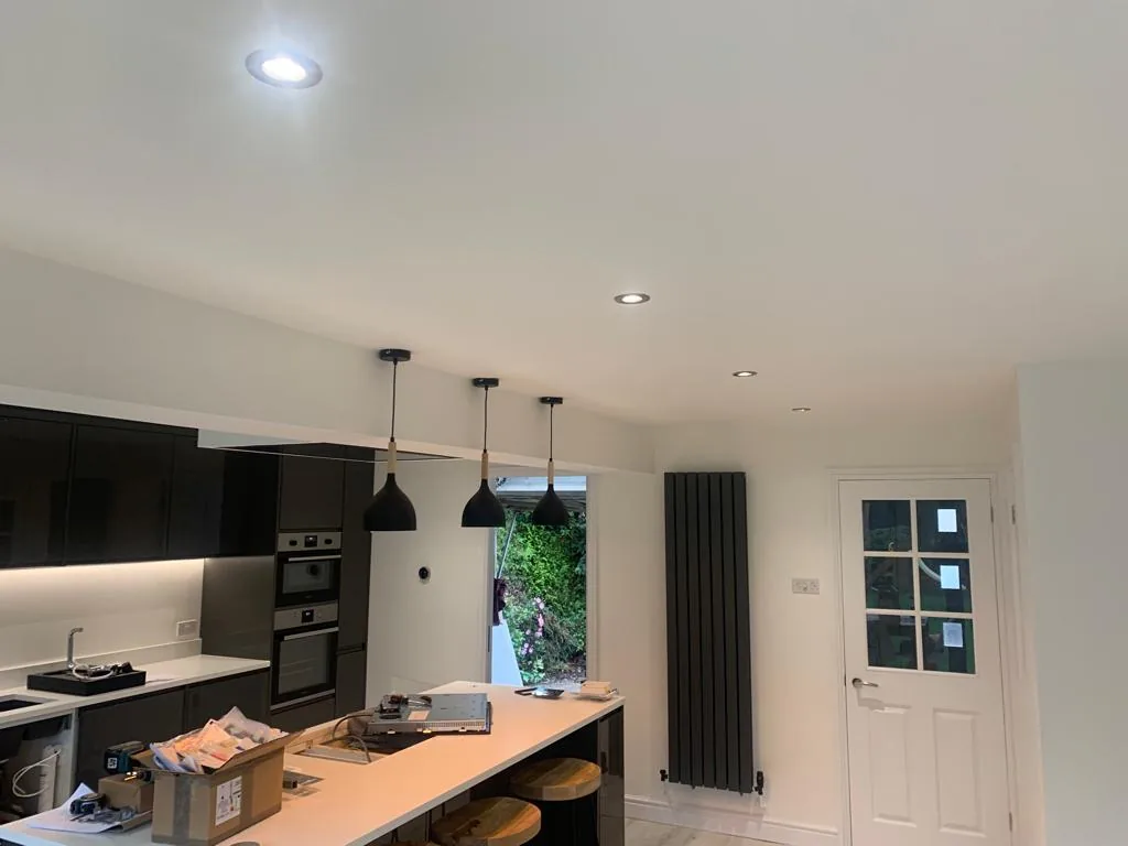 Pendant and recessed lighting in a kitchen